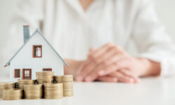 Saving money to invest in house or property in the future. Business Finance Concept.